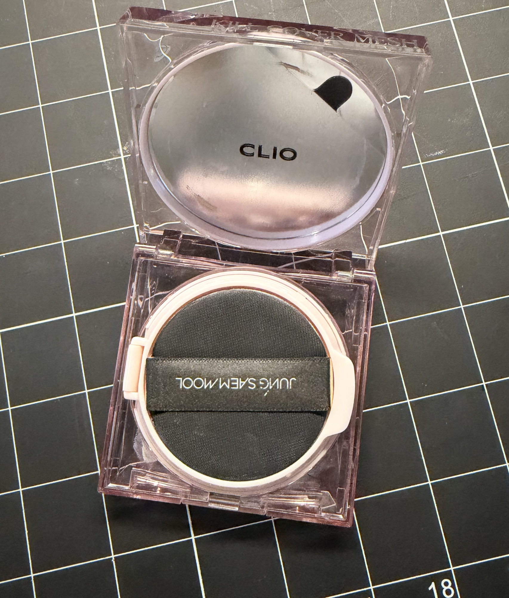 Makeup foundation cushion, opened case from top view.