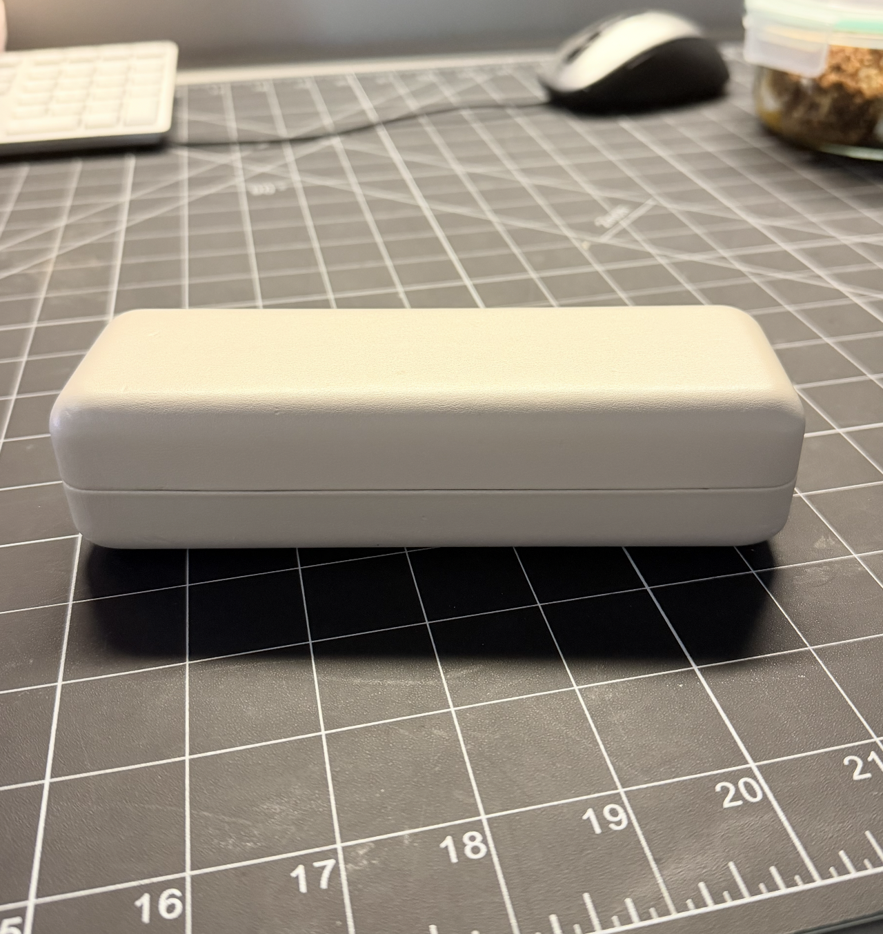 Glasses case, front-facing.